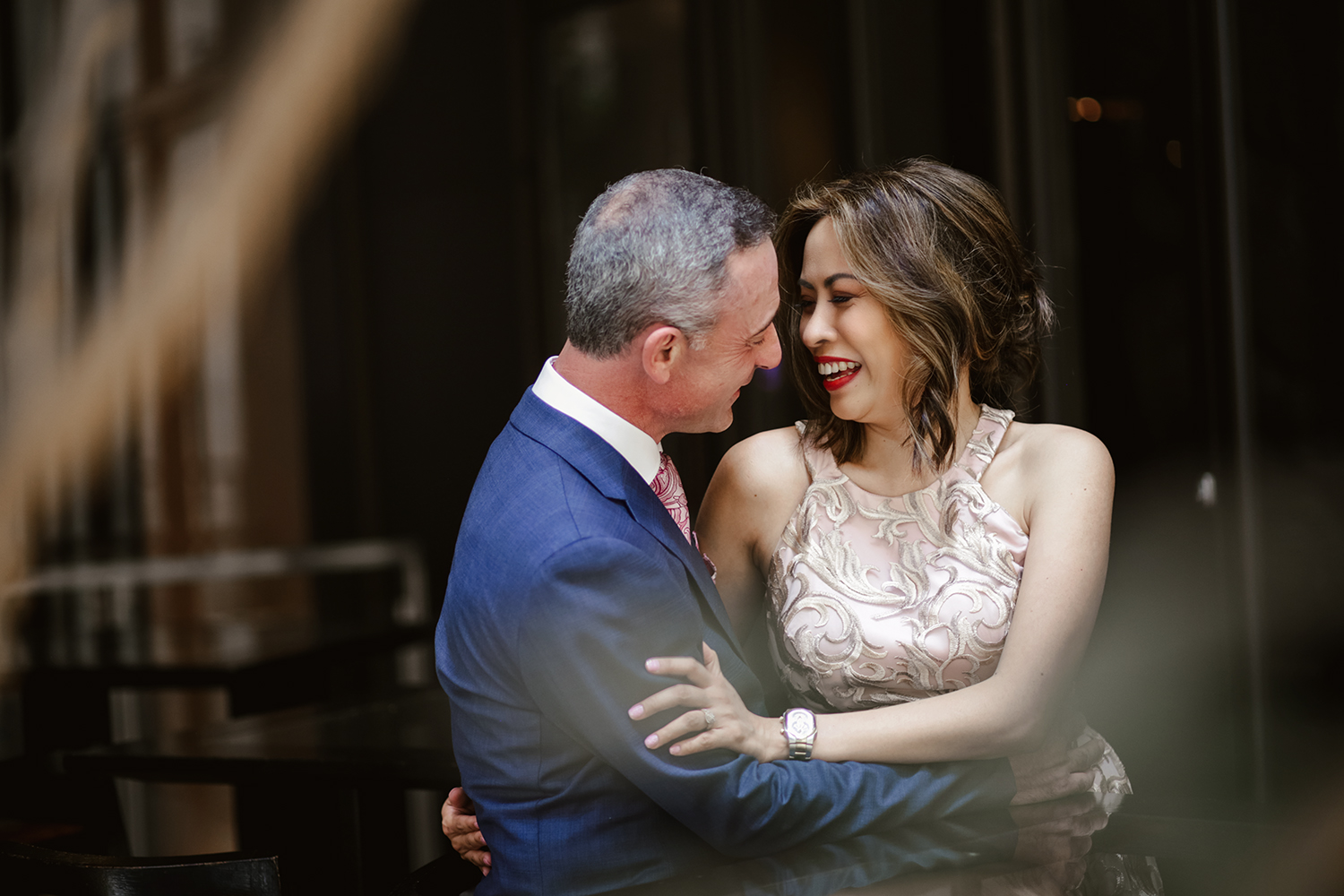 Intimate close-up of a bride and groom with their foreheads touching and eyes closed. A natural, emotional wedding portrait capturing a quiet moment in soft light, perfect for Mornington Peninsula wedding inspiration